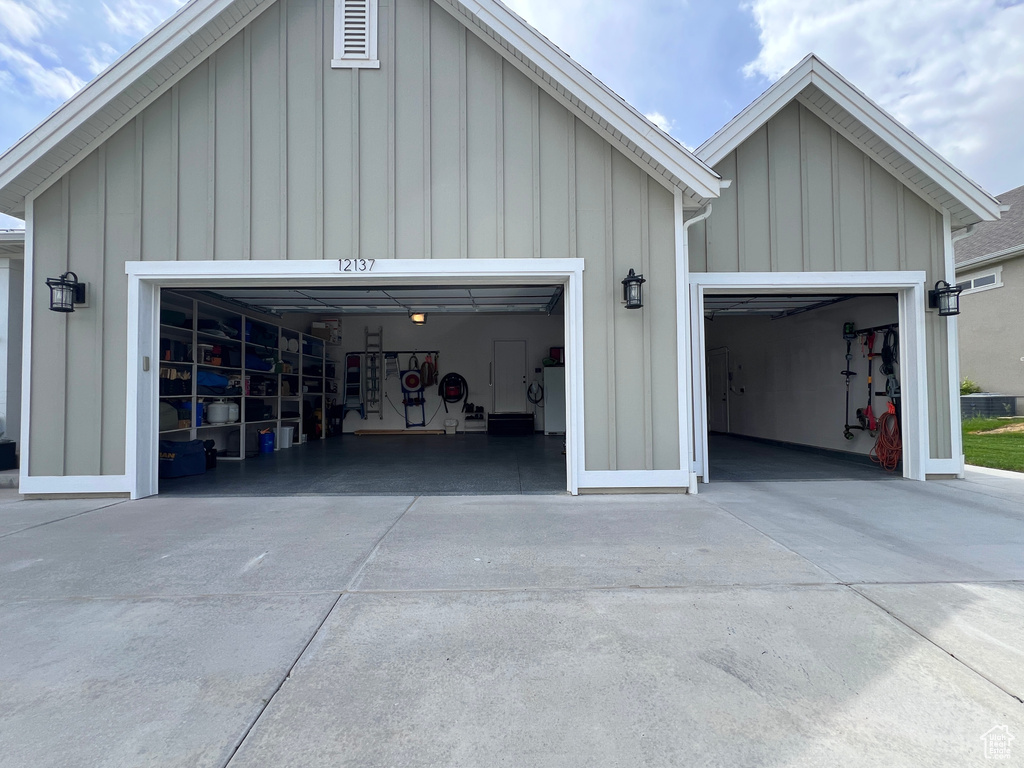 Garage with concrete driveway