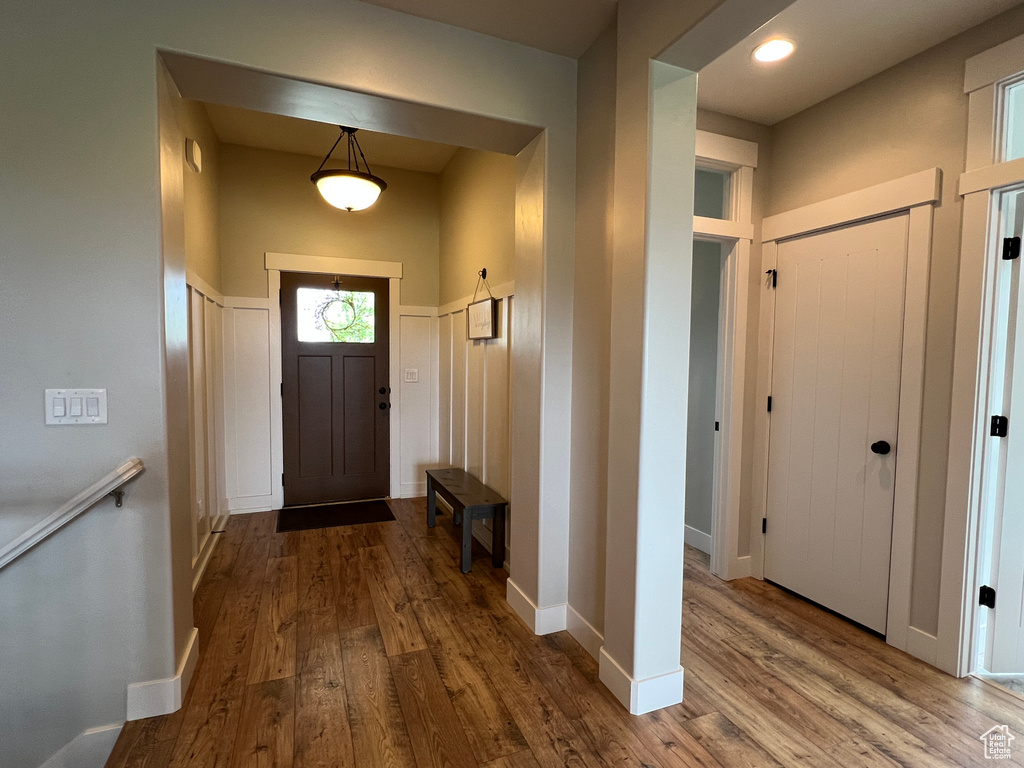 Foyer with wood finished floors