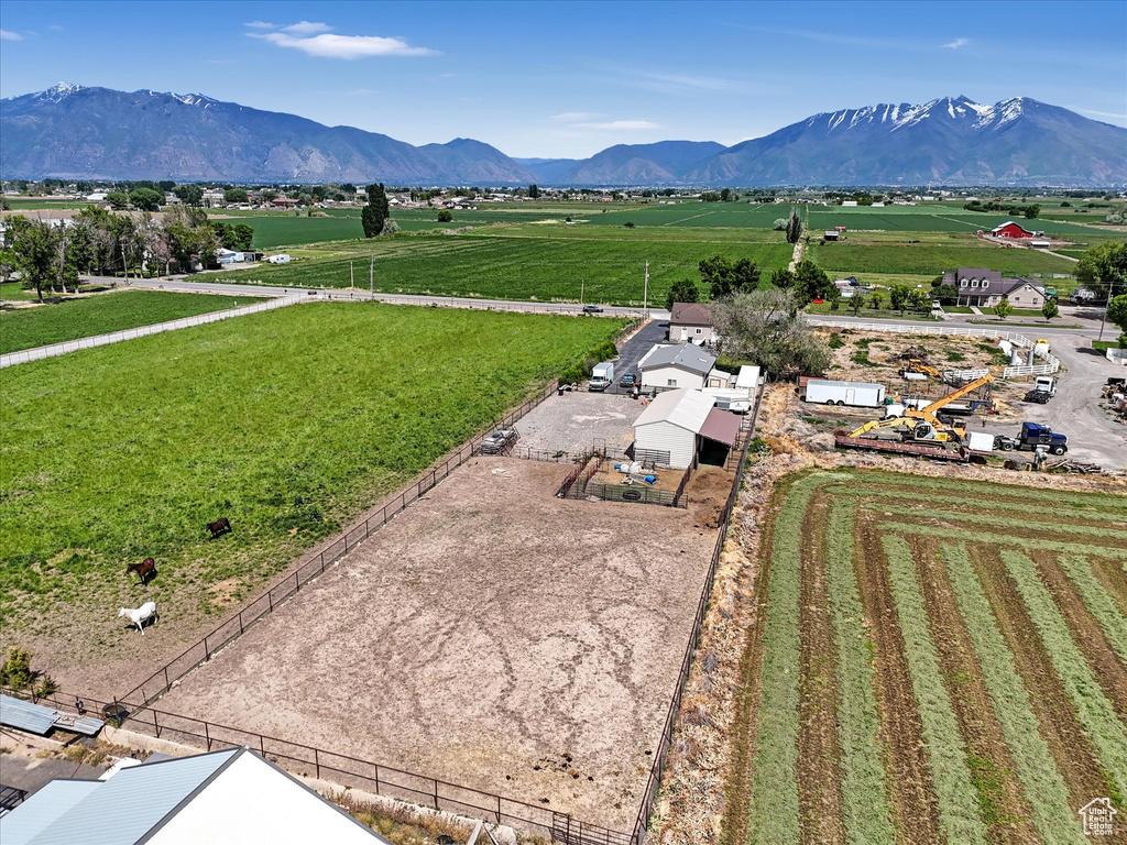 Aerial view of sparsely populated area with a mountainous background