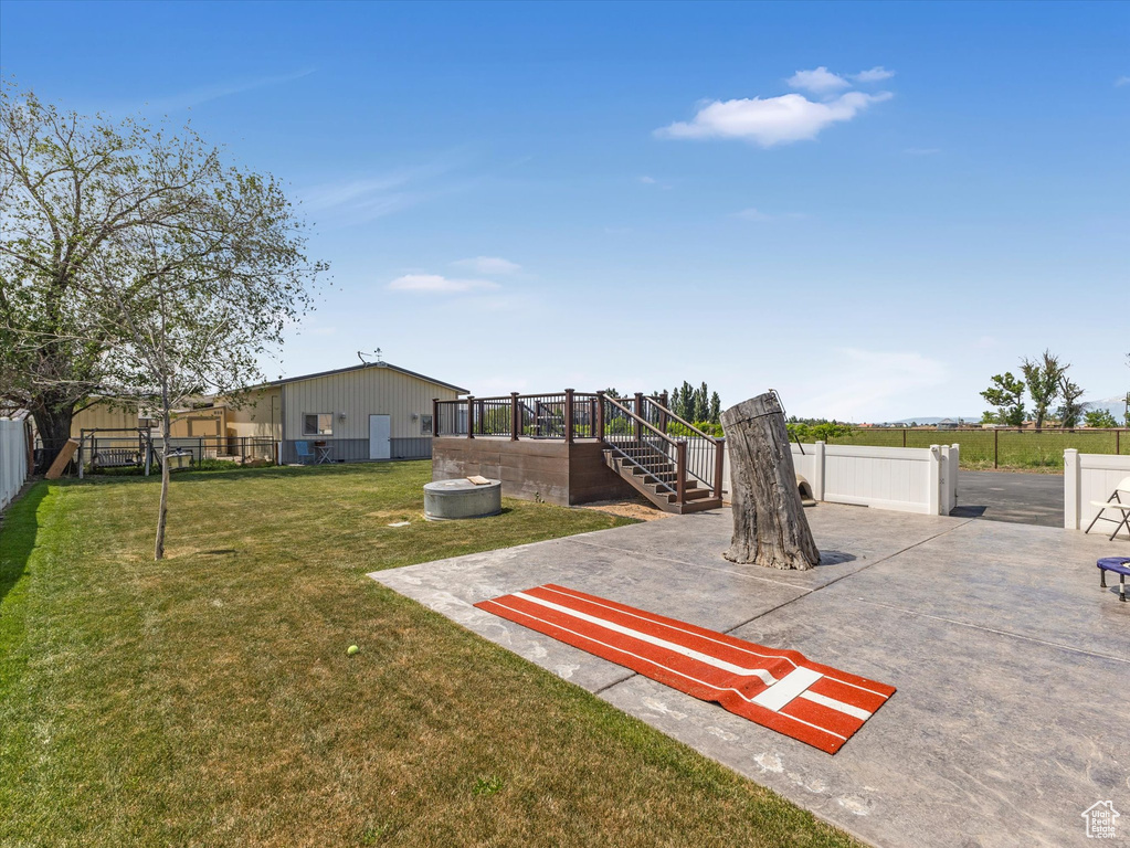 View of yard with a patio area