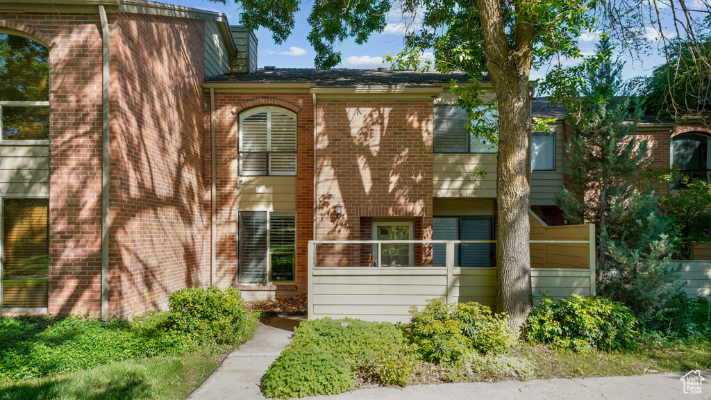 View of front of property featuring brick siding