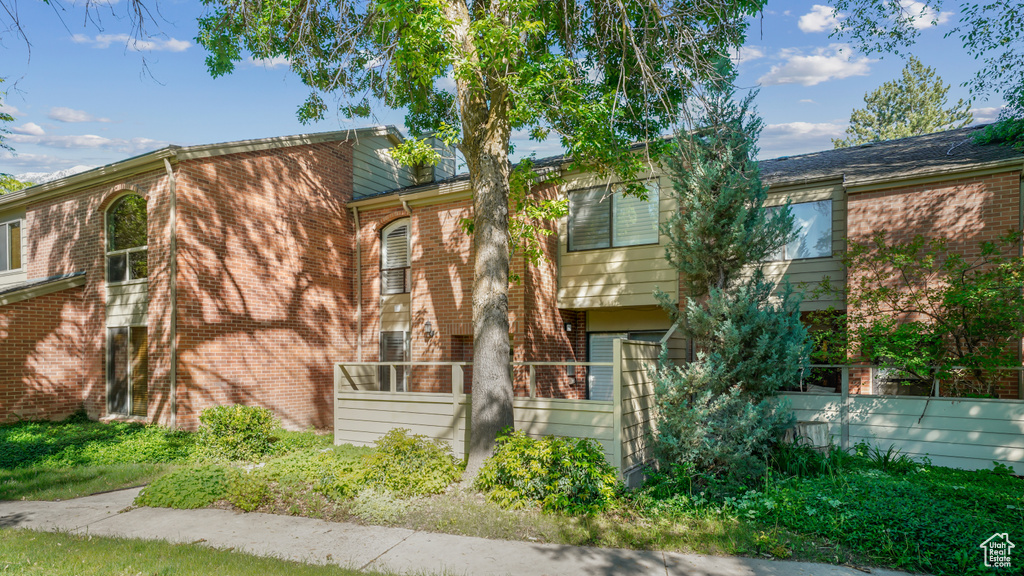 View of front of home with brick siding