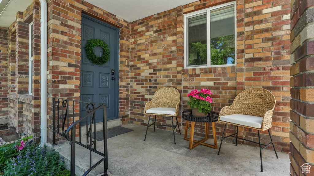 Property entrance with brick siding