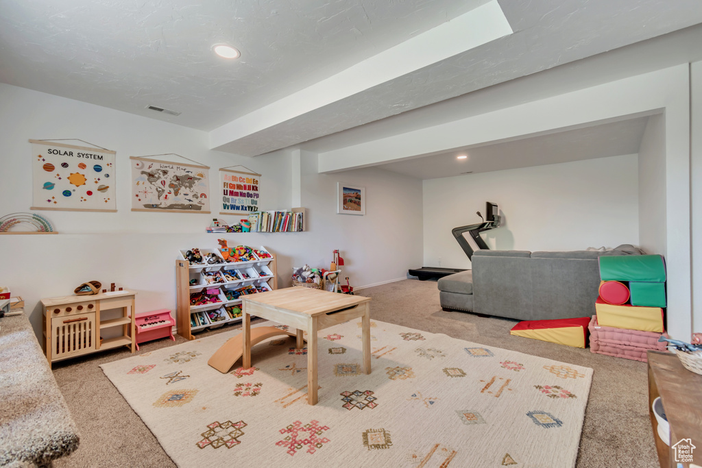 Rec room with carpet flooring, recessed lighting, and baseboards