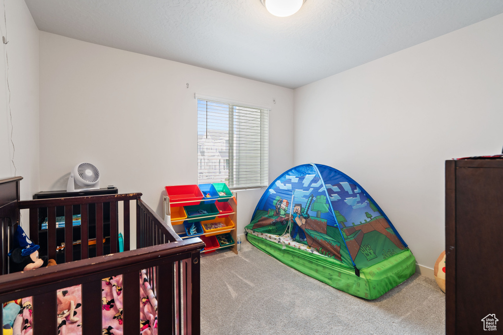 Bedroom featuring carpet flooring