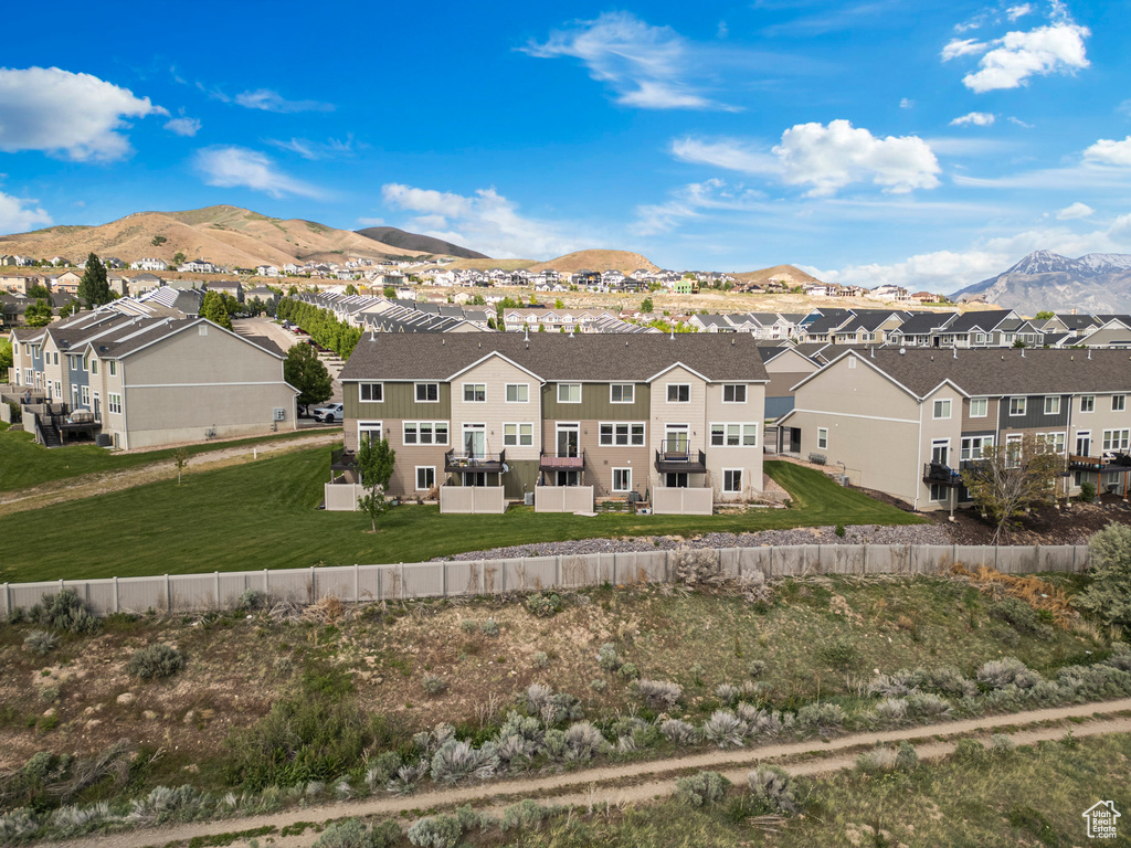 Aerial perspective of suburban area with mountains