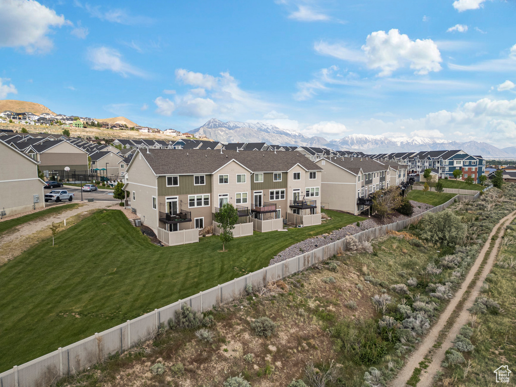 Aerial view of residential area with mountains