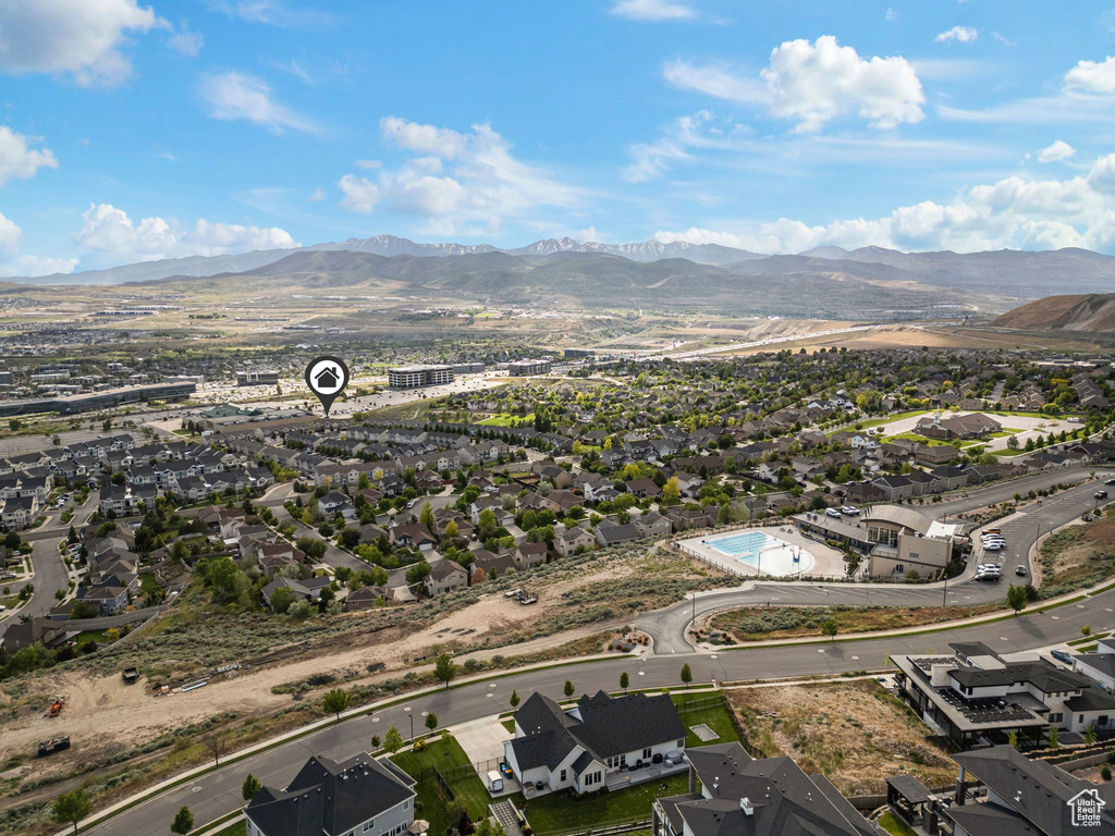 Aerial perspective of suburban area with mountains