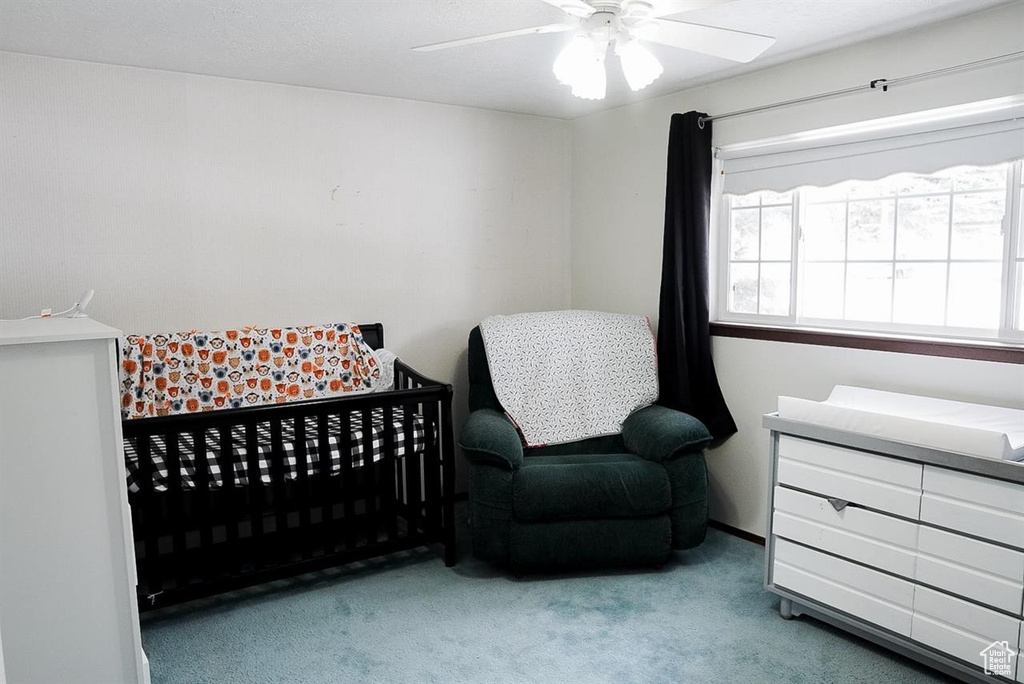 Bedroom with carpet floors and ceiling fan