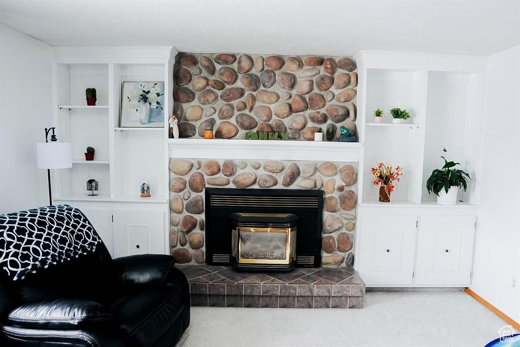 Living area featuring carpet