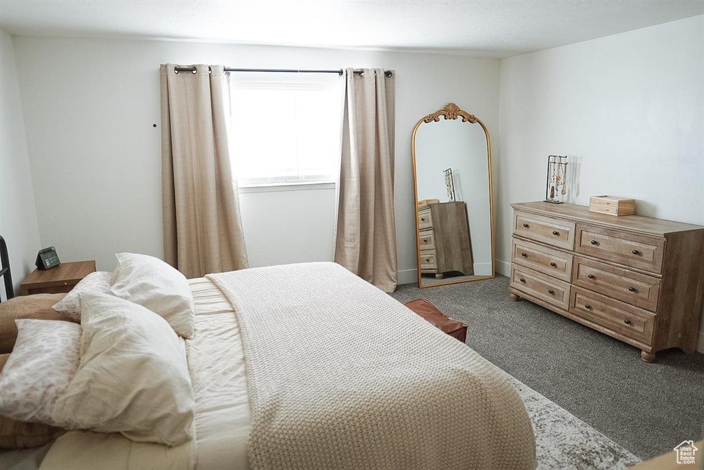 Bedroom featuring carpet