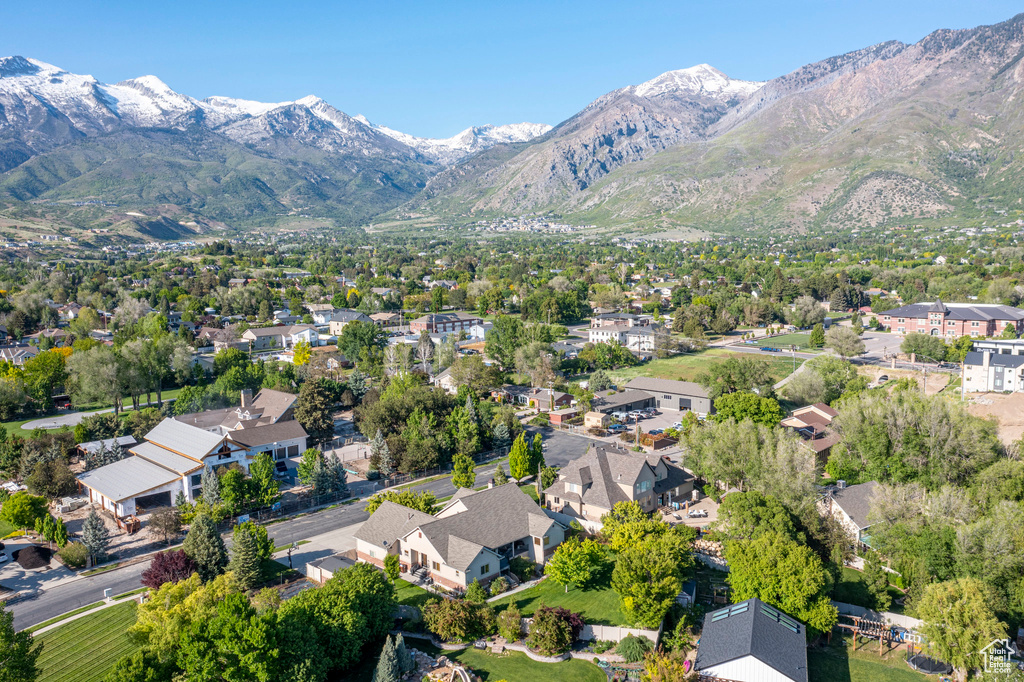 Aerial perspective of suburban area featuring mountains