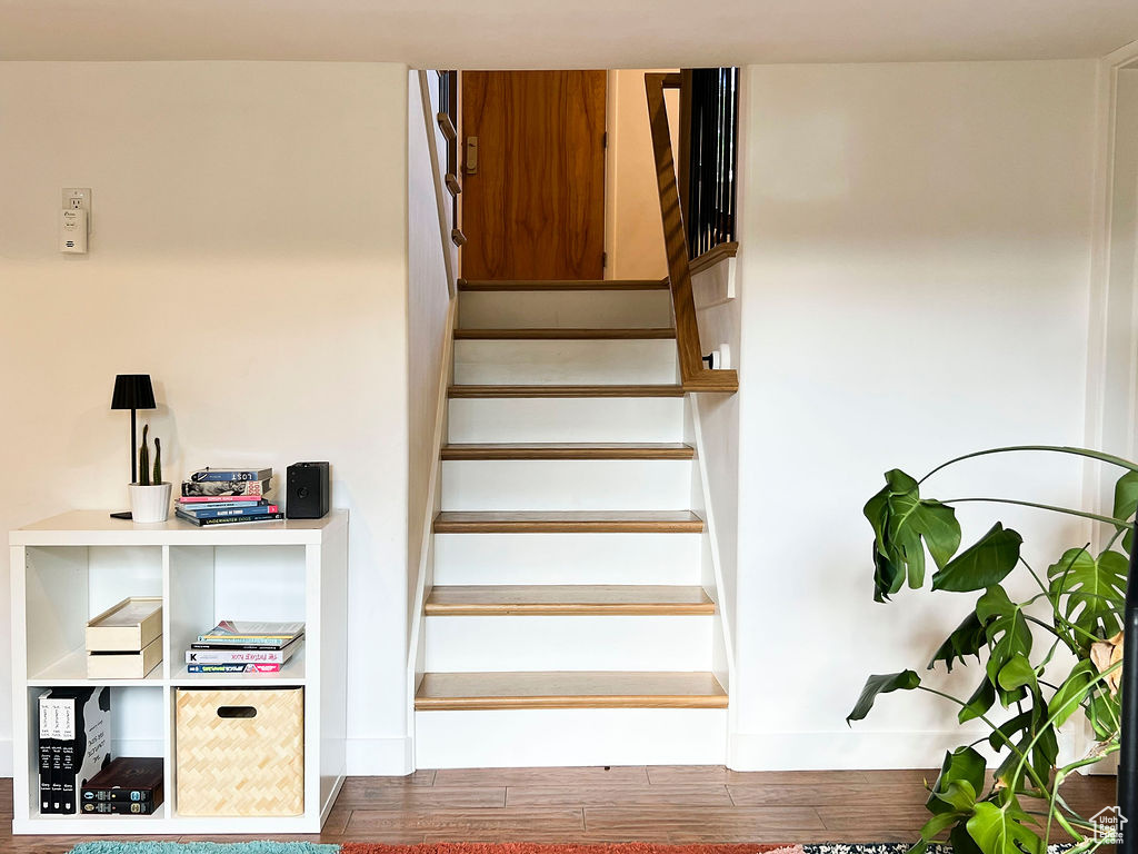 Stairway with wood finished floors