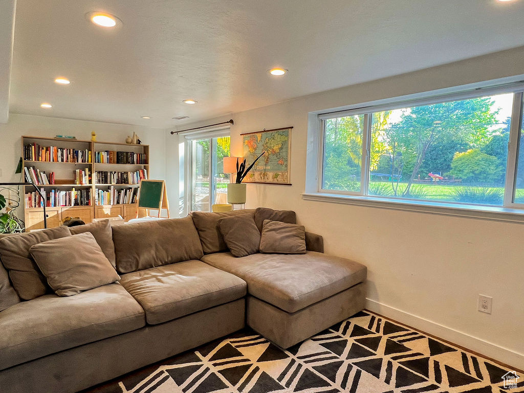 Living area featuring recessed lighting and baseboards