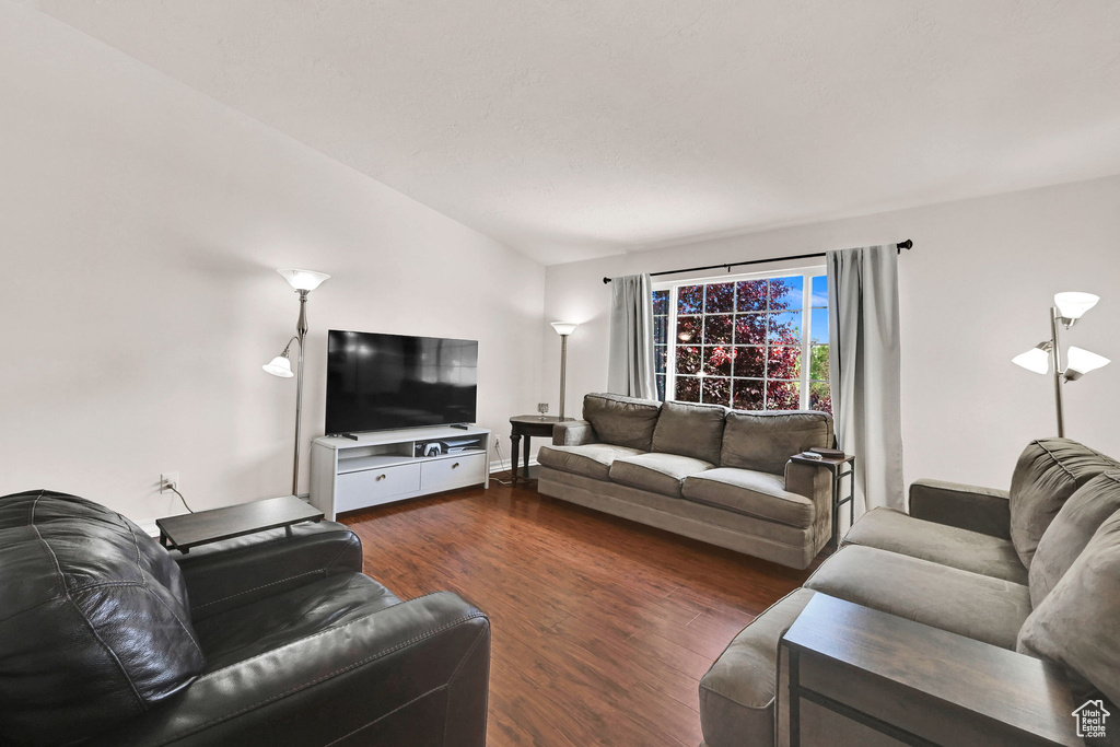 Living room featuring wood finished floors and baseboards