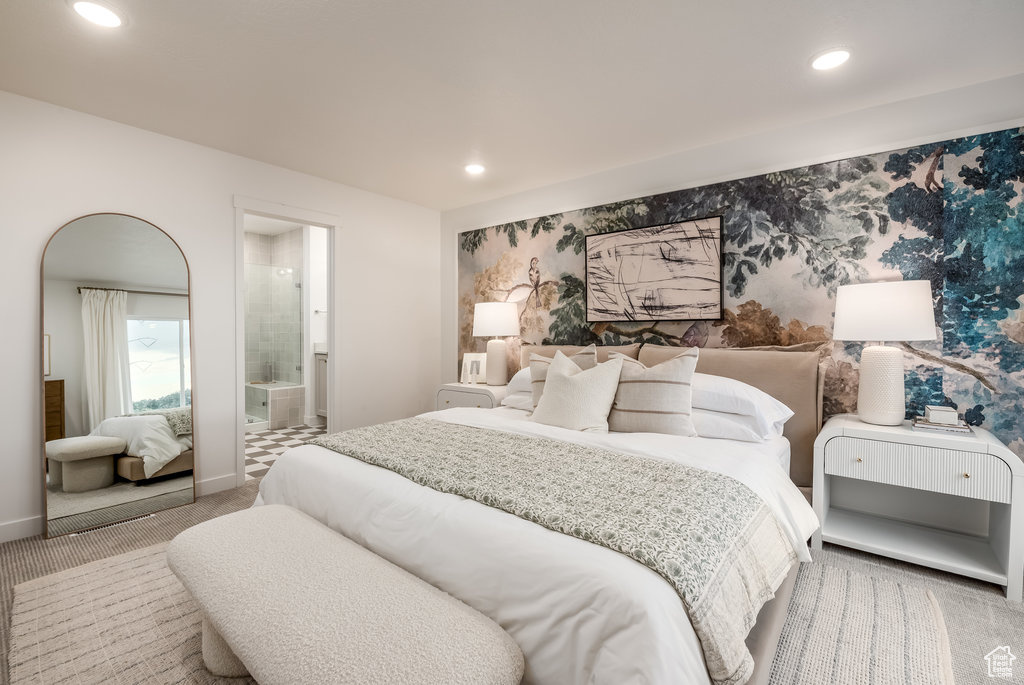 Carpeted bedroom with recessed lighting and connected bathroom