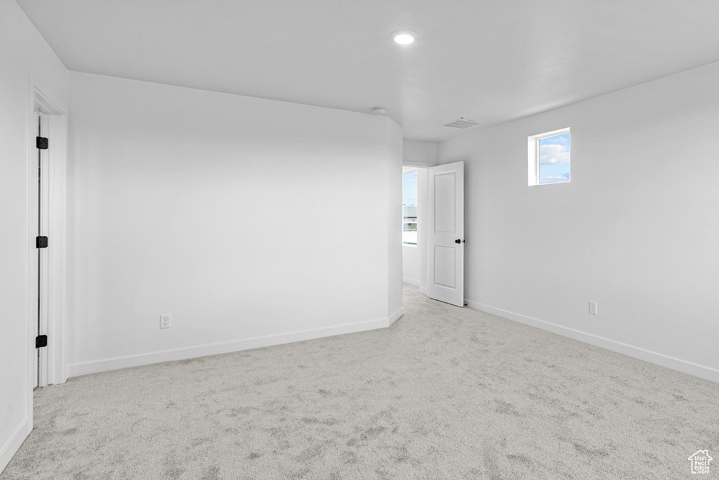 Unfurnished room with baseboards, carpet floors, and recessed lighting