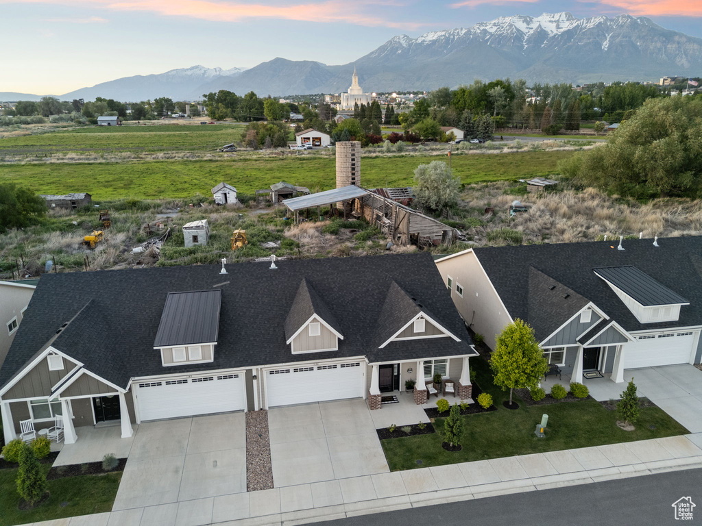 View of subject property featuring a mountain backdrop