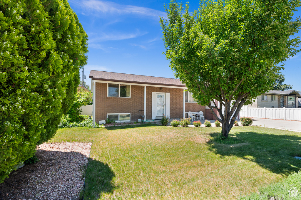 View of front of property with brick siding