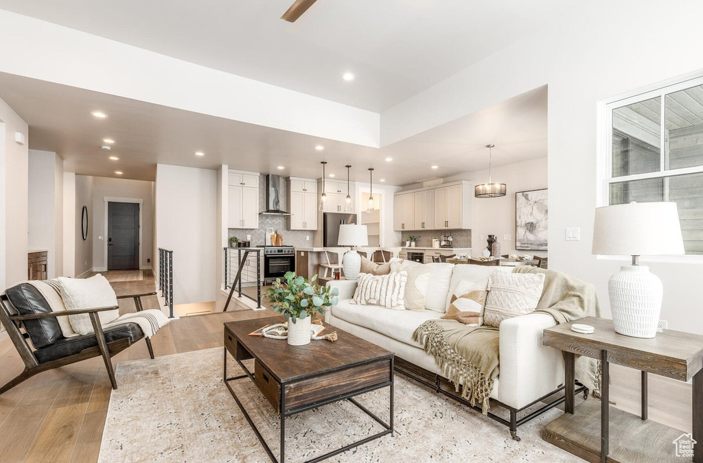 Living room featuring recessed lighting and light wood finished floors