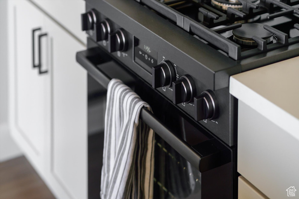 Kitchen view of black range with gas stovetop