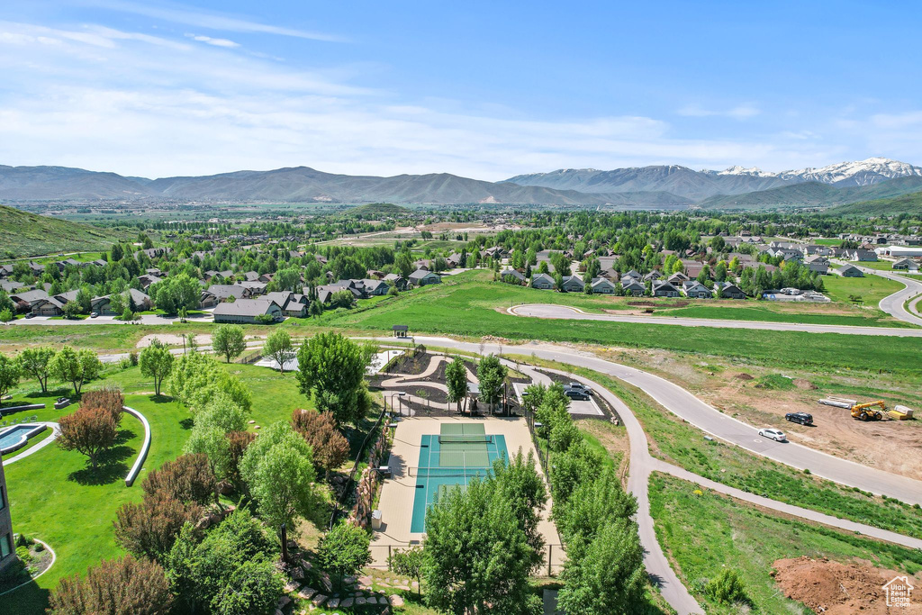 Aerial view of residential area with a mountain backdrop