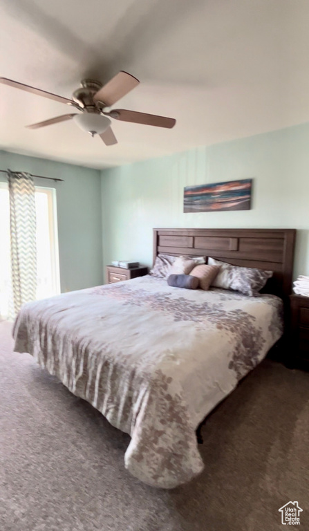 Bedroom with carpet floors and ceiling fan