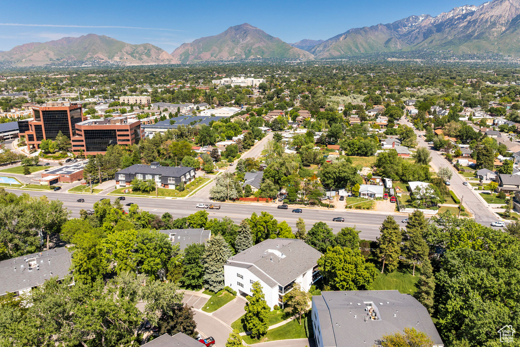 Aerial view of residential area with a mountainous background