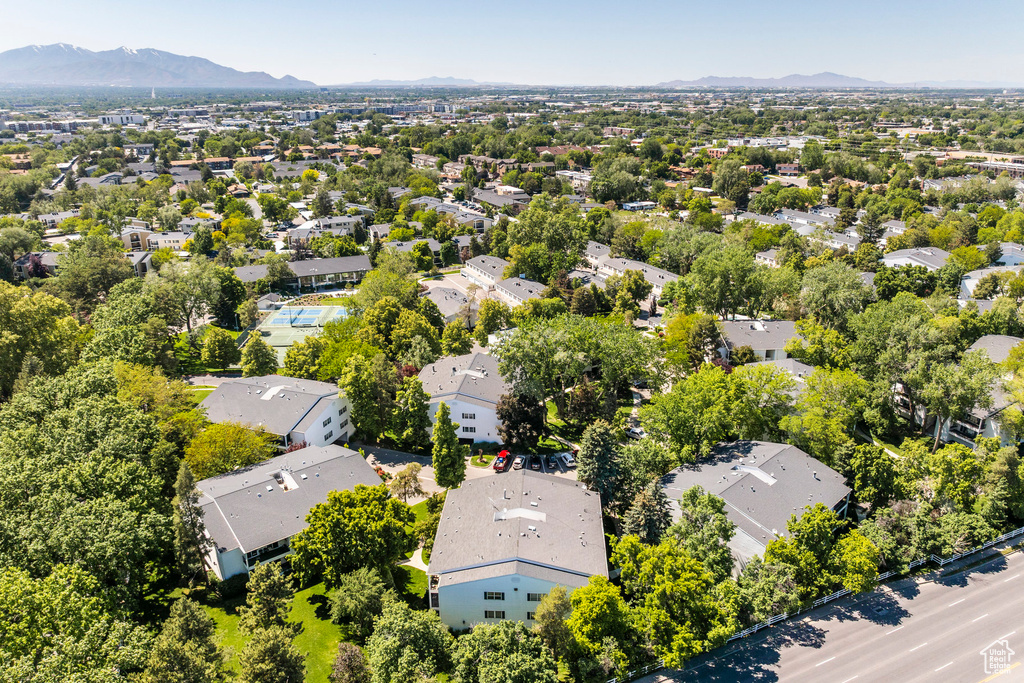 Aerial view of residential area featuring a mountain backdrop