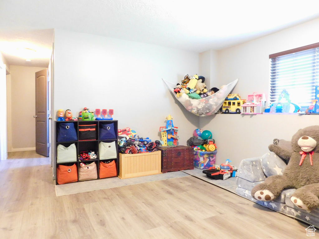Rec room with wood finished floors