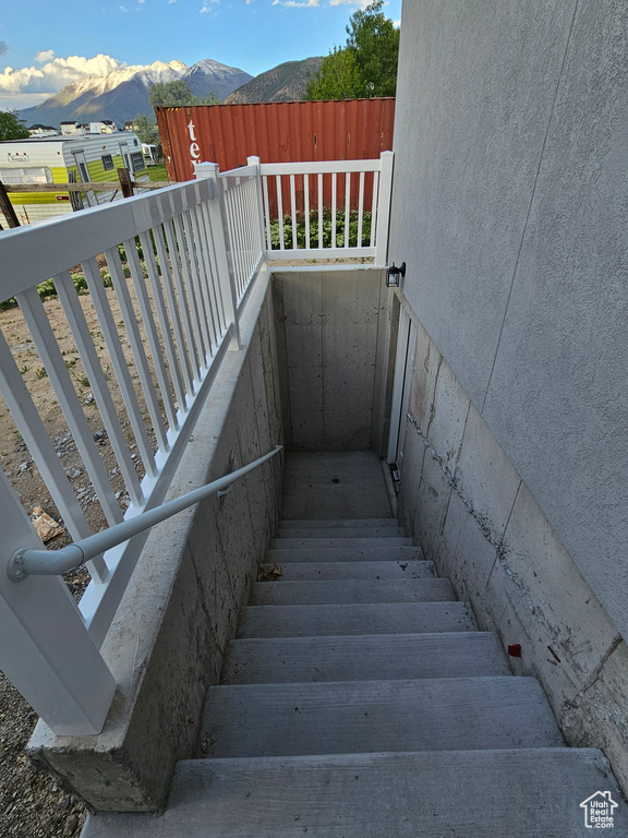Stairway featuring a mountain view
