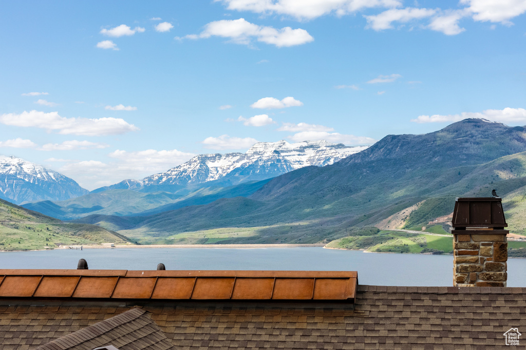 View of mountain backdrop with a large body of water