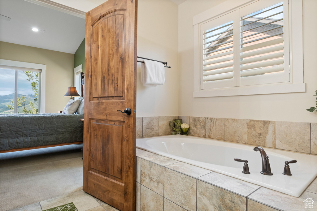 Full bathroom with connected bathroom, a bath, recessed lighting, and tile patterned flooring