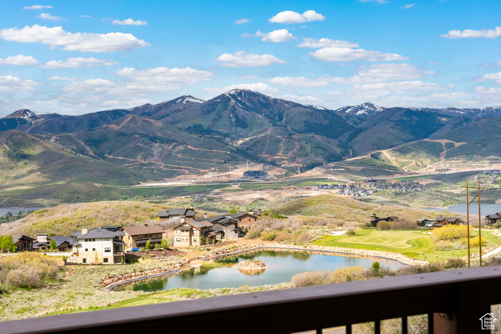 View of mountain backdrop with a nearby body of water