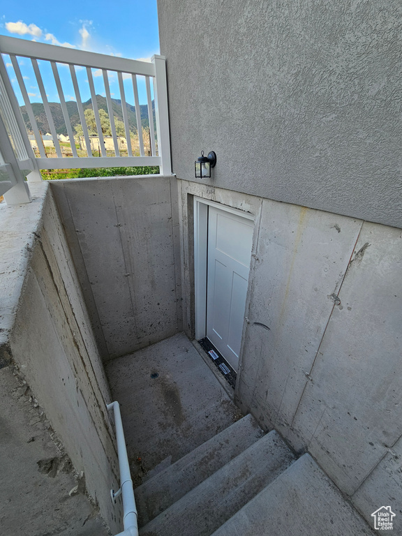 Stairway featuring a mountain view