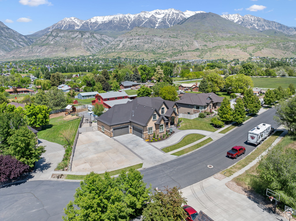 Aerial view of residential area with a mountainous background