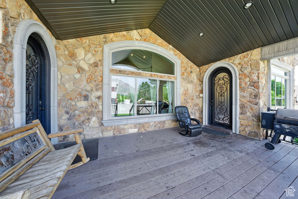 Wooden terrace with a grill