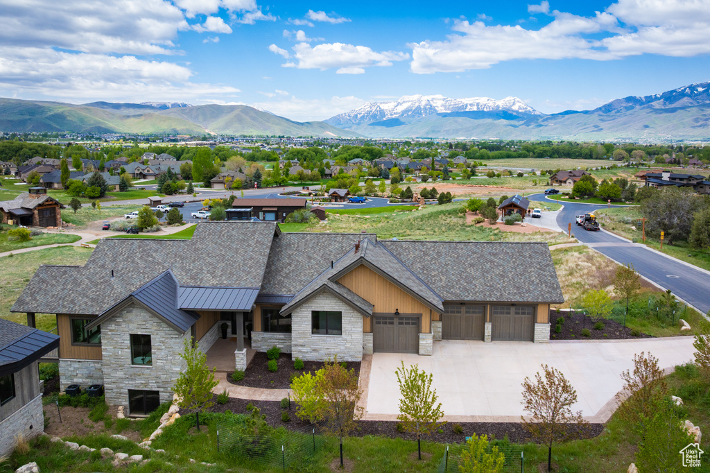 View of subject property featuring a mountain backdrop