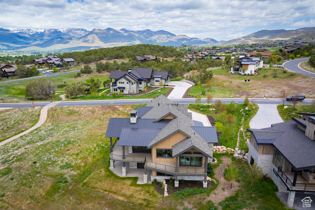 Aerial view of residential area with mountains