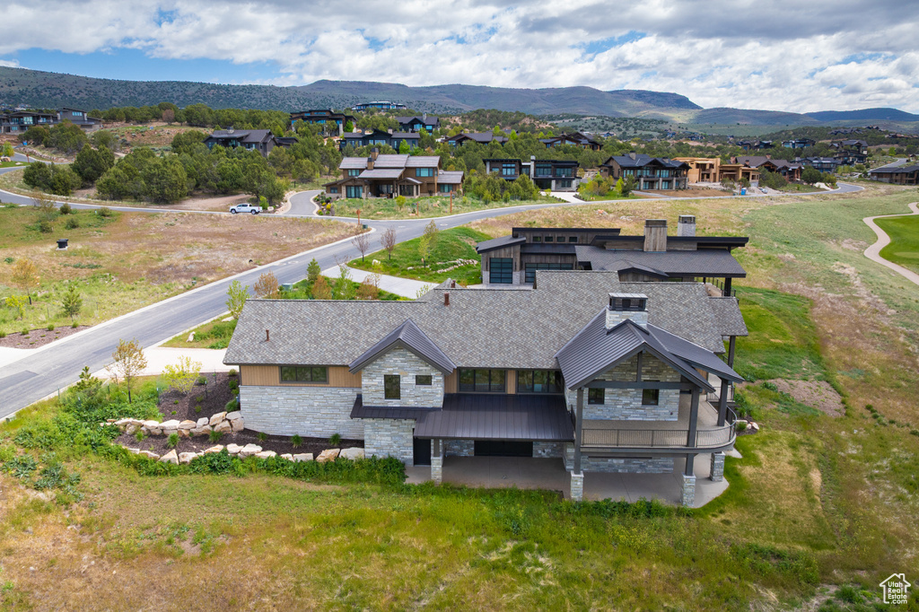 Aerial view of residential area with a mountain backdrop