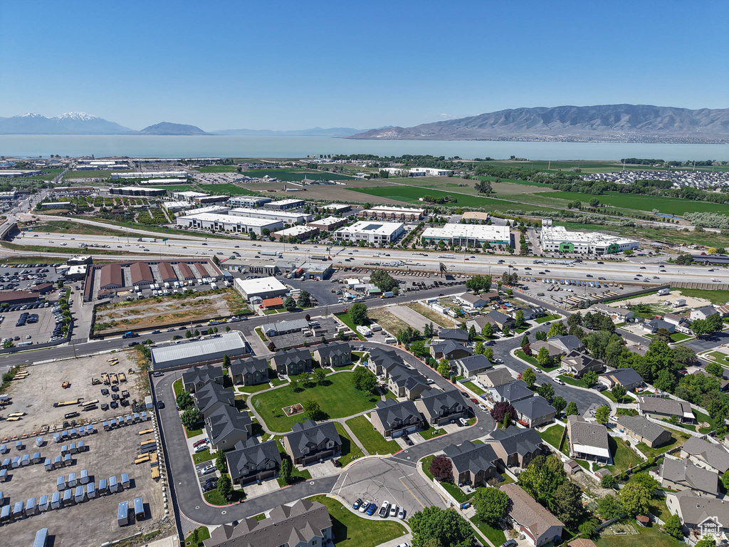 View of property location featuring a water and mountain view