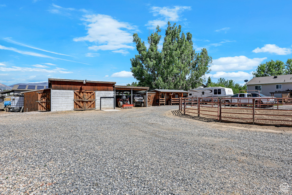 View of outbuilding with an exterior structure