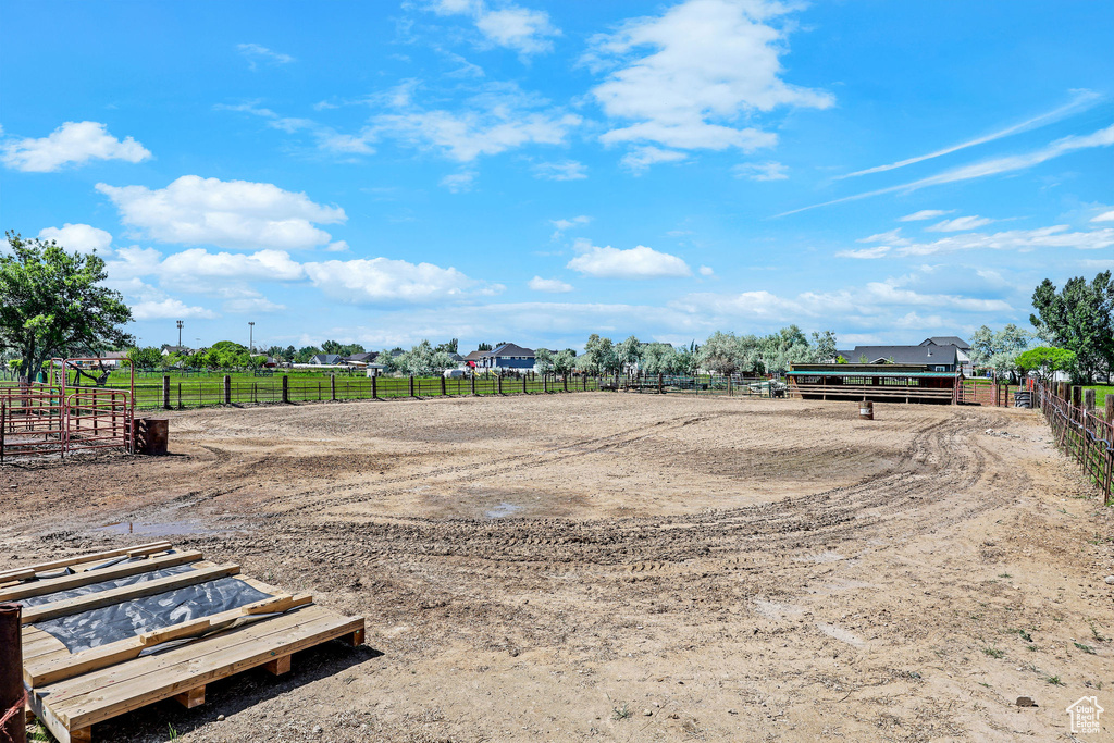 View of yard featuring an outdoor riding arena and a view of countryside