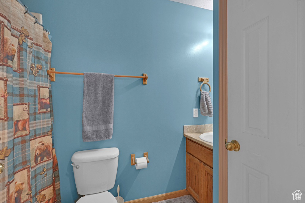 Bathroom with vanity and toilet