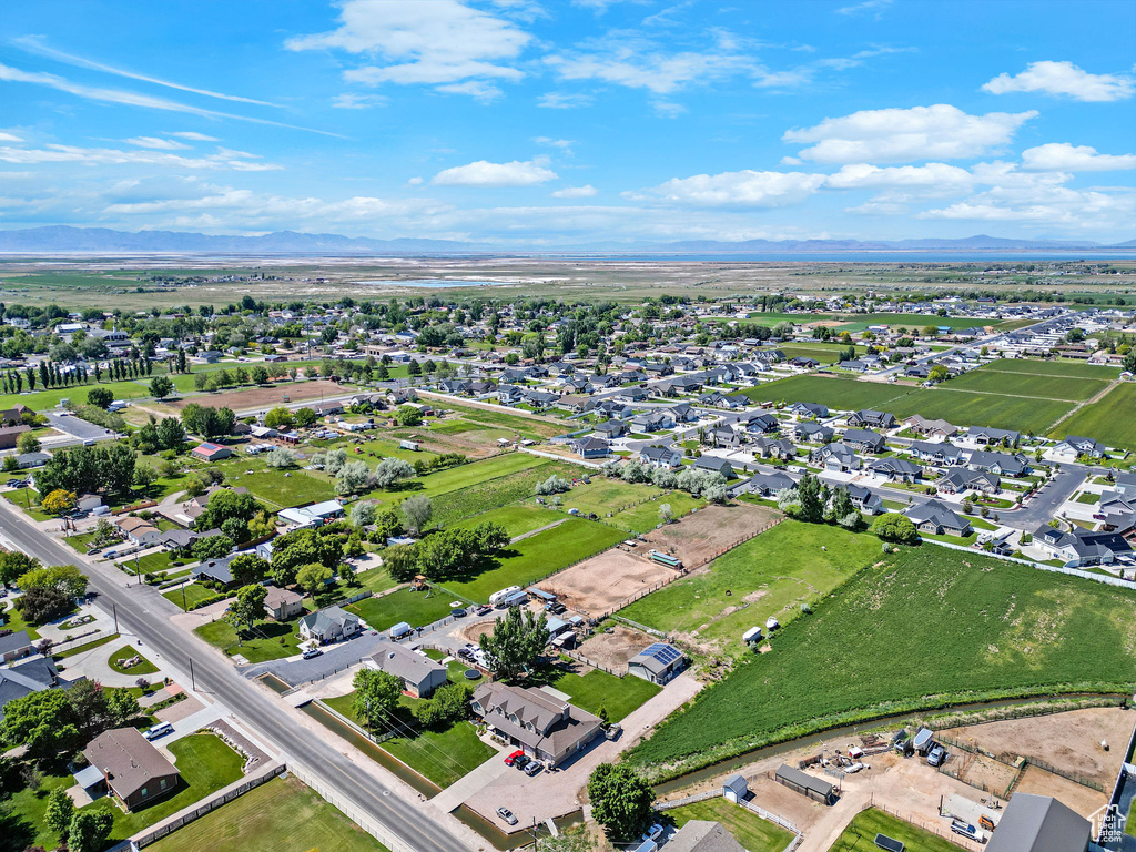 Aerial view of residential area with a mountainous background