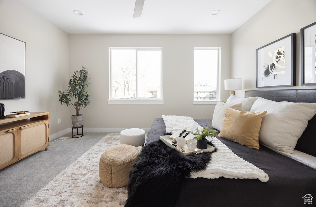 Bedroom with carpet, baseboards, ceiling fan, and recessed lighting
