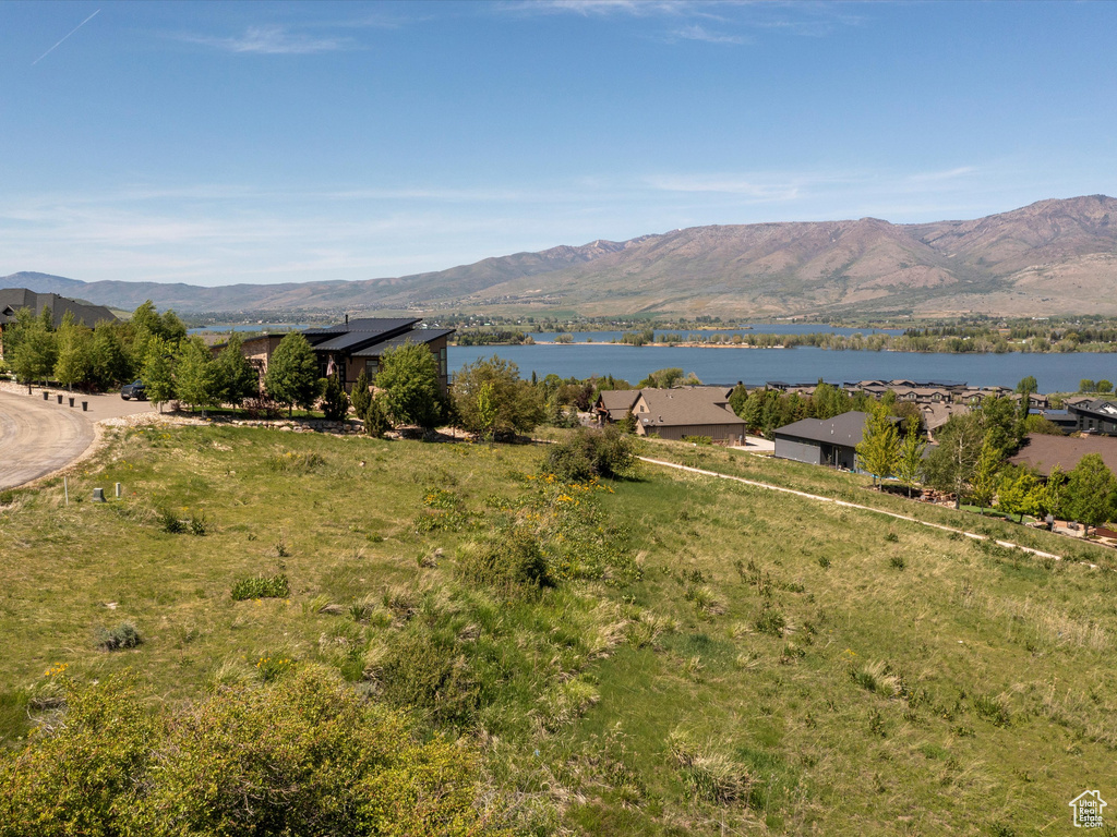 View of mountain backdrop with a nearby body of water