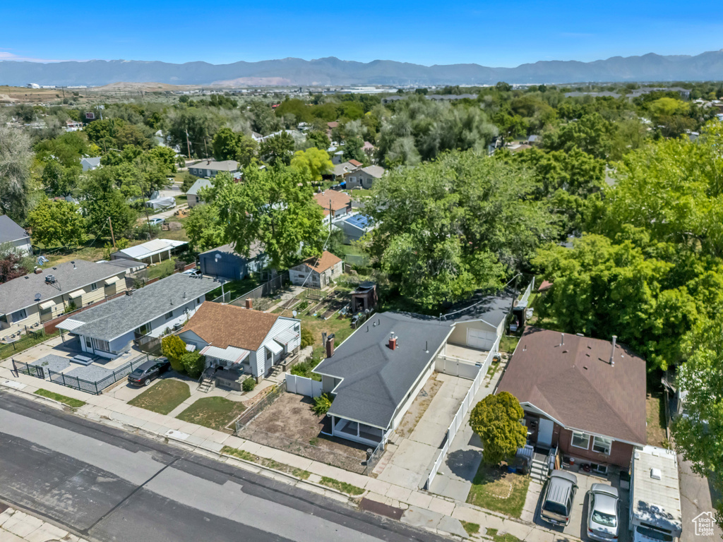 Aerial view of residential area featuring mountains