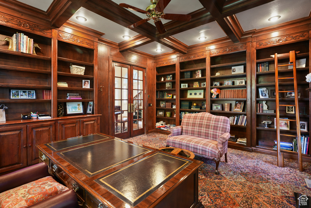Office space featuring coffered ceiling, crown molding, ceiling fan, built in features, and french doors