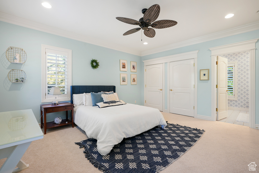 Bedroom featuring ornamental molding, carpet floors, a closet, recessed lighting, and a ceiling fan